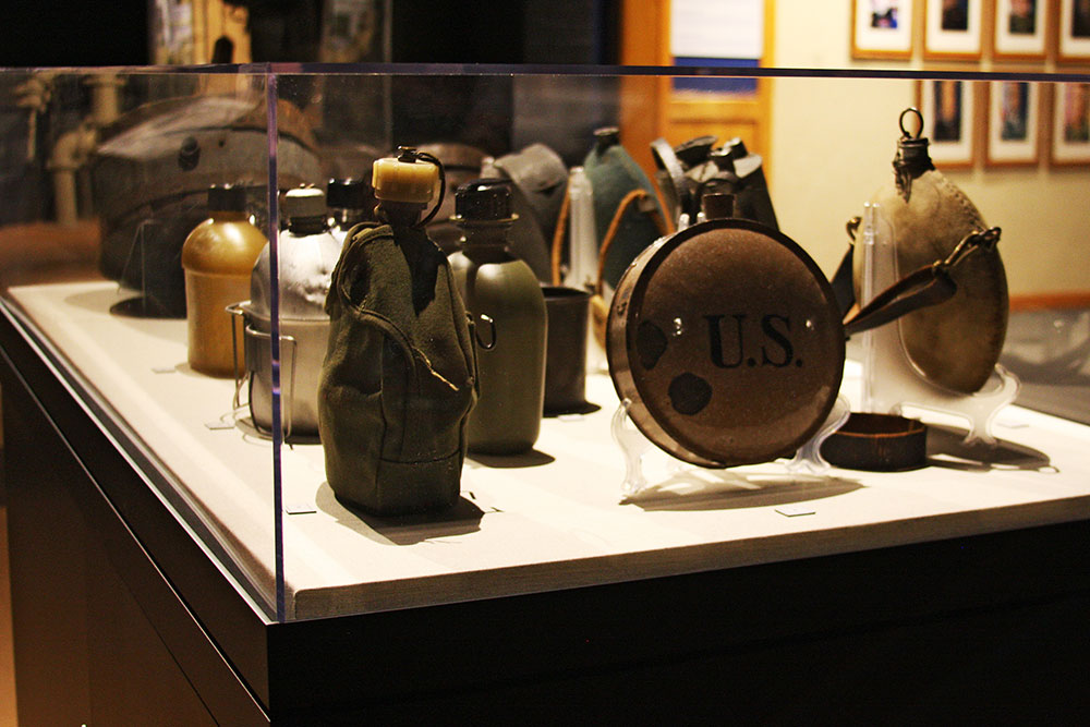 Several canteens on display as part of an exhibit at the US Army Quartermaster Museum.